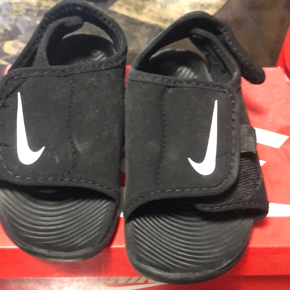 Nike Black Sandals with Adjustable Straps and Textured Sole